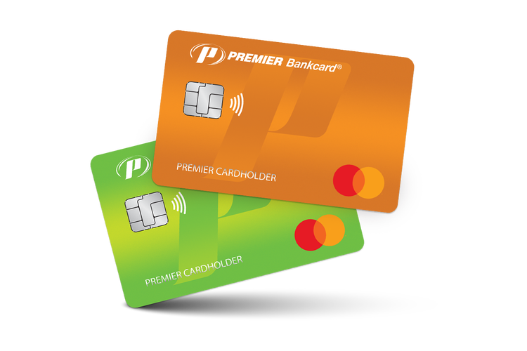 orange credit card stacked on lime green credit card